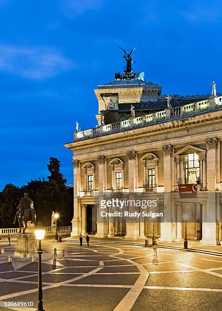 the piazza del campidoglio at twilight with the equestrian statue of marcus aurelius in the centre, - capitoline museums stock pictures, royalty-free photos & images