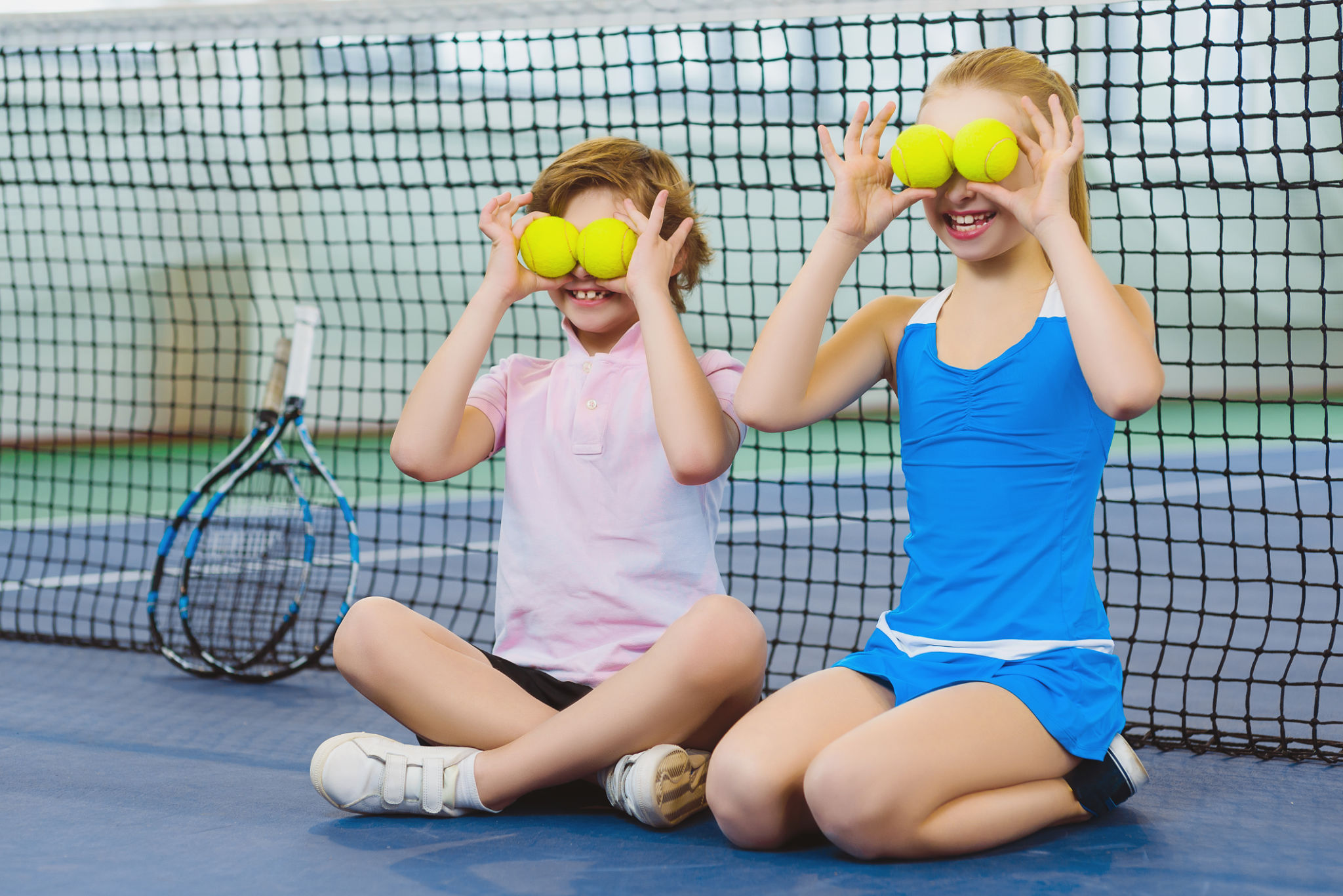 children playing tennis