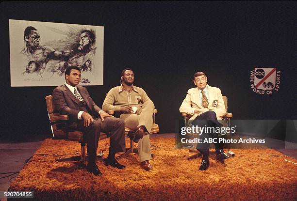 Shoot date: January 30, 1974 Muhammad Ali, Joe Frazier and Howard Cosell. MUHAMMAD ALI;JOE FRAZIER;HOWARD COSELL