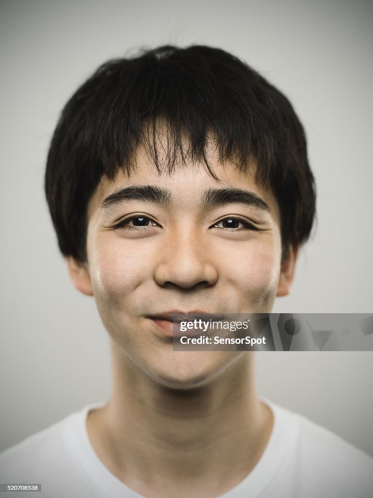 Portrait of a japanese teenager with kind expression.