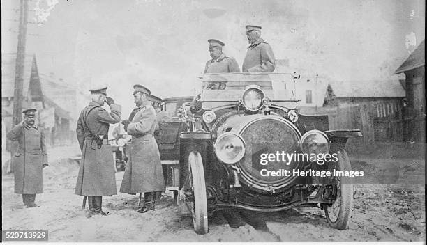 Nicholas II of Russia, Grand Duke Nicholas Nikolaevich and General Count Georgi Bobrinsky at the front. Private Collection.