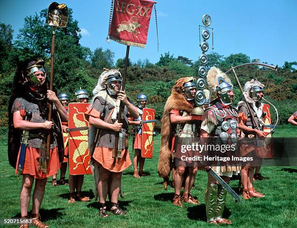 Re-enactors dressed as Roman soldiers.