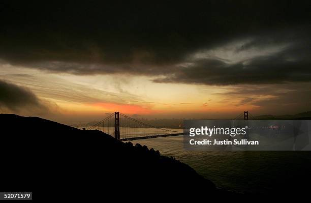 The Golden Gate Bridge is seen as the sun rises January 27, 2005 in San Francisco. A controversial film made by moviemaker Eric Steel documenting...
