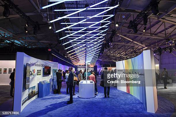 Attendees view the Surround 360 camera booth during the Facebook F8 Developers Conference in San Francisco, California, U.S., on Tuesday, April 12,...