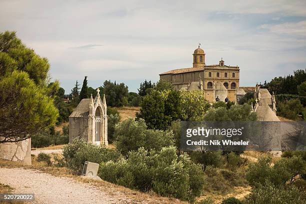 The seventeenth century Chapelle-Notre-Dame-de-Grace, with its unusual Italian style facade, and its Stations of the Cross stand in vineyards and...