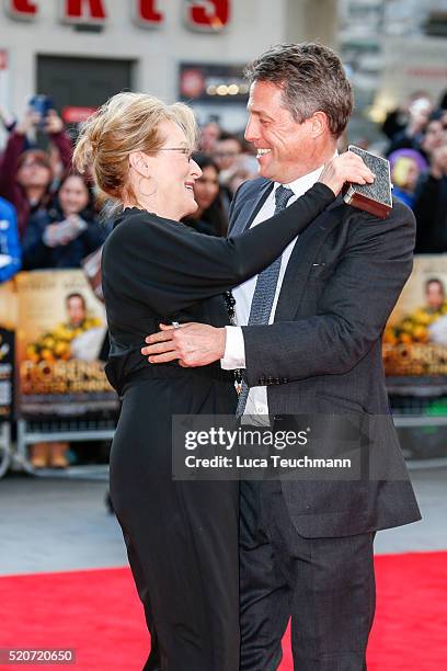 Meryl Streep and Hugh Grant arrive for the UK film premiere Of "Florence Foster Jenkins" at Odeon Leicester Square on April 12, 2016 in London,...