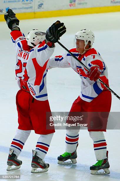 In Hyok Kang of Korea celebrates after a goal with Myoung Chol Kim during the match between New Zealand and Korea as part of the 2016 IIHF Ice Hockey...