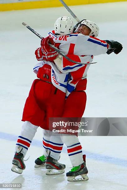 In Hyok Kang of Korea celebrates after a goal with Myoung Chol Kim during the match between New Zealand and Korea as part of the 2016 IIHF Ice Hockey...