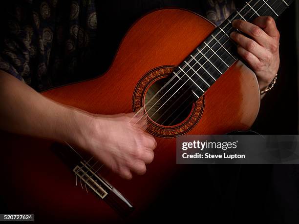 classical guitarist - acoustic guitar close up stock pictures, royalty-free photos & images