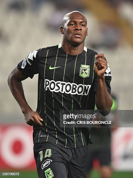 Colombia's Atletico Nacional player Victor Ibarbo celebrates after scoring against Peru's Sporting Cristal during their Libertadores Cup football...