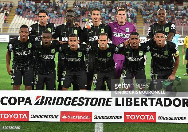 Players of Colombia's Atletico Nacional pose for pictures before the start of their Libertadores Cup football match against Peru's Sporting Cristal...