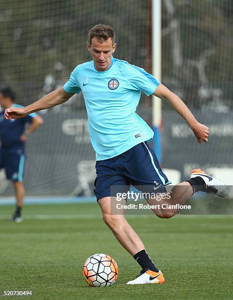 Alex Wilkinson of Melbourne City kicks the ball during a Melbourne City A-League training session at City Football Academy on April 13, 2016 in...