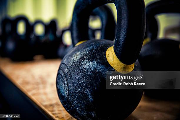 gym kettlebell close-up at gym - robb reece stock pictures, royalty-free photos & images