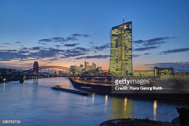 european central bank ecb with banks skyline - european central bank stock pictures, royalty-free photos & images
