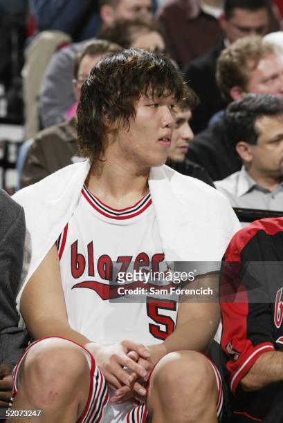 Ha Seung-Jin of the Portland Trail Blazers sits on the sidelines during the game against the Cleveland Cavaliers on January 19, 2005 at the Rose...