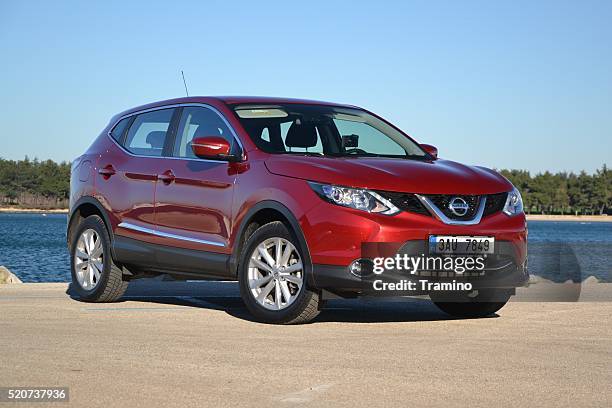 nissan qashqai - the most popular crossover in europe - nissan stock pictures, royalty-free photos & images