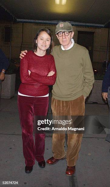 Woody Allen and Soon-Yi Previn enter Madison Square Garden to watch New York Knicks take on the Sacramento Kings on January 4, 2005 in New York City.