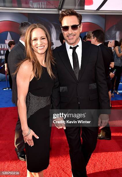 Producer Susan Downey and actor Robert Downey Jr. Attend the premiere of Marvel's "Captain America: Civil War" at Dolby Theatre on April 12, 2016 in...