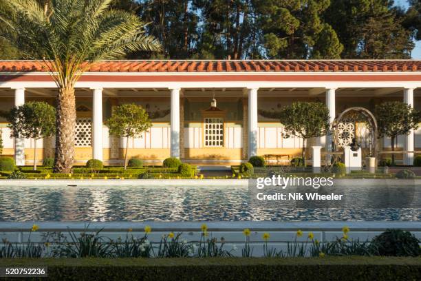 The outer peristyle formal gardens at the Getty Villa Museum, modelled after the Villa del Papiri, a Roman country house in Herculaneum, buried by...