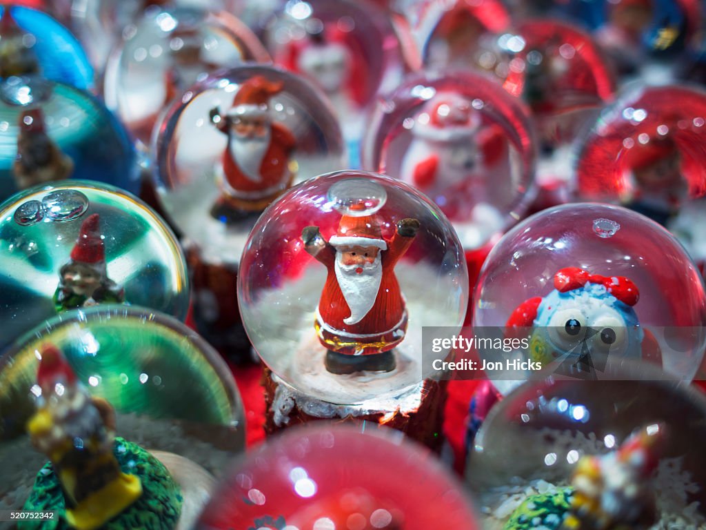 Snow globes for sale in the Verona Christmas Market, Italy.