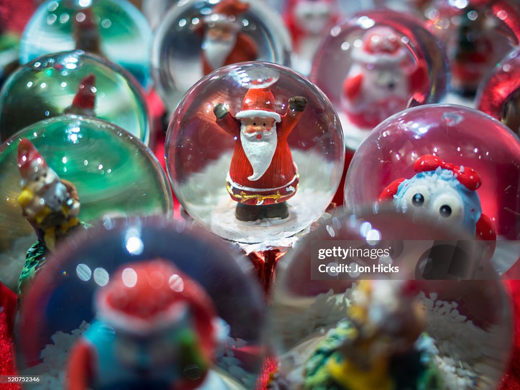 Snow globes for sale in the Verona Christmas Market, Italy.