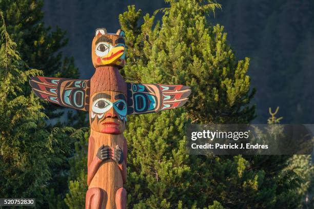 saxman village totem, ketchikan, alaska. - totem pole stock pictures, royalty-free photos & images