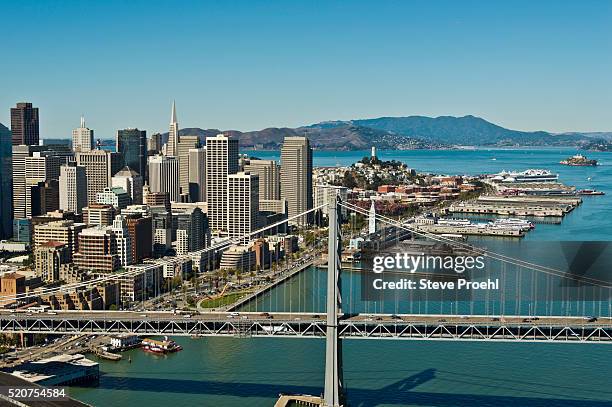 san francisco waterfront - san francisco oakland bay bridge stockfoto's en -beelden