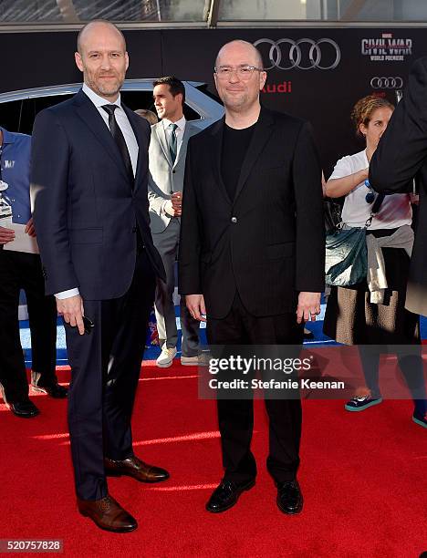 Writers Stephen McFeely and Christopher Markus attend the World Premiere of "Captain America: Civil War" hosted by Audi at Dolby Theatre on April 12,...