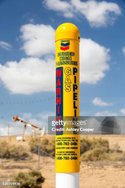 a gas pipeline in the kern river oilfield in oildale, bakersfield, california, usa. - kern river oil field stock pictures, royalty-free photos & images