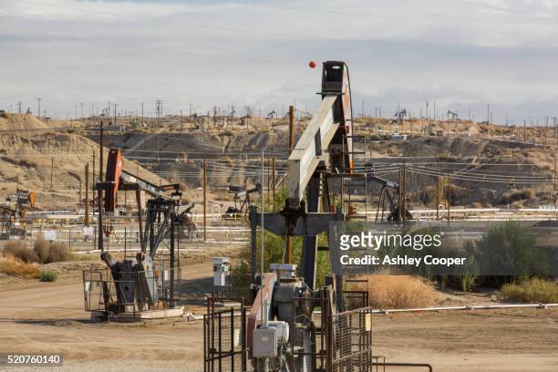 the kern river oilfield in oildale, bakersfield, california, usa, in unprecedented drought. - kern river oil field stock pictures, royalty-free photos & images