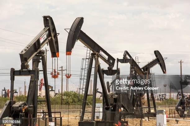the kern river oilfield in oildale, bakersfield, california, usa. - kern river oil field stock pictures, royalty-free photos & images