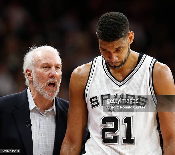 San Antonio head coach Gregg Popovic talks with Tim Duncan of the San Antonio Spurs as he comes out against the Oklahoma City Thunder at AT&T Center...