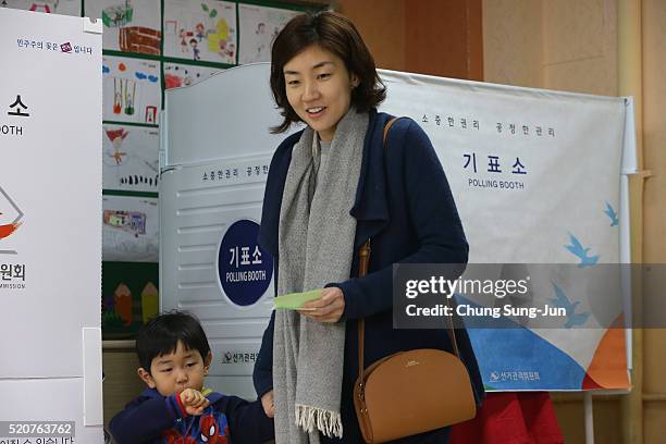 South Koreans cast their votes in a polling station on April 13, 2016 in Seoul, South Korea. A total of 300 lawmakers will be elected to the...