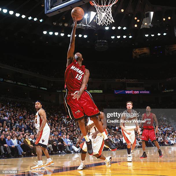 Damon Jones of the Miami Heat shoots a layup during a game against the Golden State Warriors at The Arena in Oakland on January 12, 2005 in Oakland,...