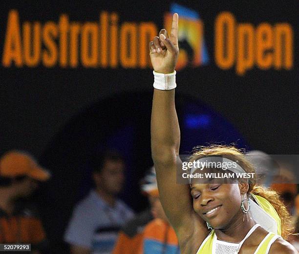 Serena Williams of the US celebrates her victory over compatriot Lindsay Davenport in the women's singles final at the 2005 Australian Open tennis...