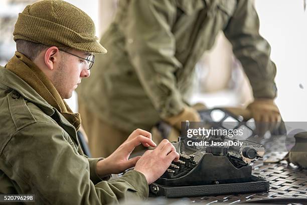 ww ii: specialist typing a report - 1944 stock pictures, royalty-free photos & images