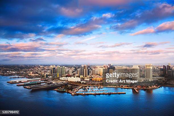 aerial view of the downtown san diego skyline at dusk - san diego stock pictures, royalty-free photos & images