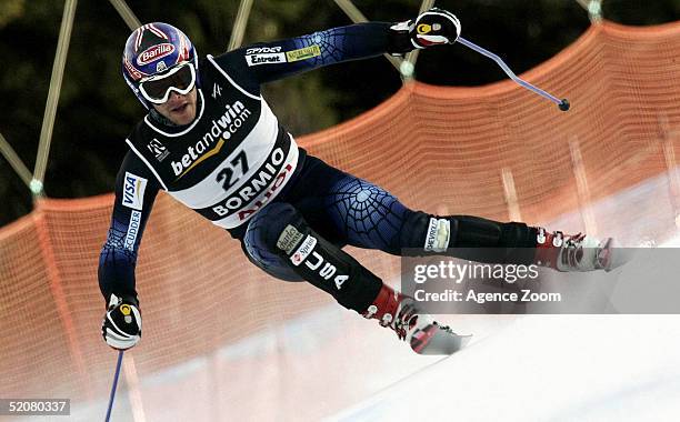 Bode Miller of USA competes during his first place finish in the Men's Super G at the FIS Alpine World Ski Championships on January 29, 2005 in...