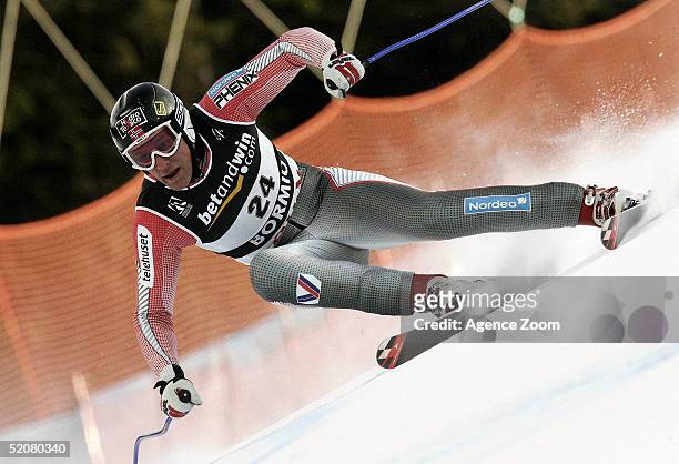 Aksel Lund Svindal of Norway competes during his seventh place finish in the Men's Super G at the FIS Alpine World Ski Championships on January 29,...