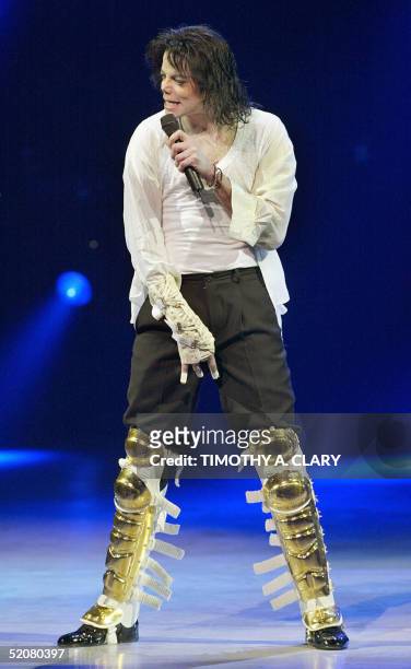 This 24 April, 2004 file photo shows pop singer Michael Jackson performing during the Democratic National Committee benefit concert "A Night at the...