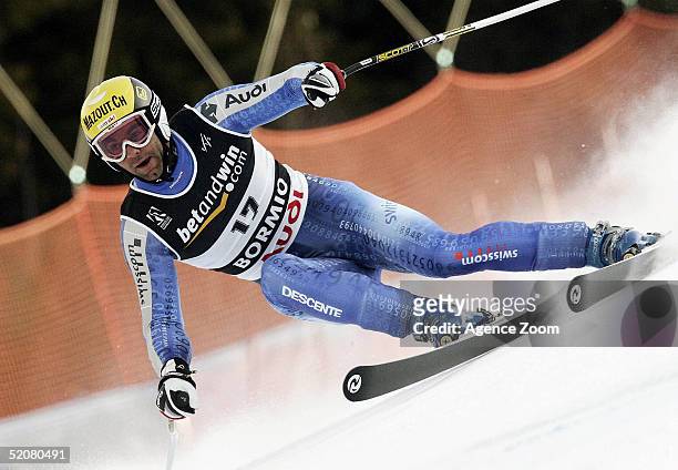 Didier Defago of Switzerland competes during his seventh place finish in the Men's Super G at the FIS Alpine World Ski Championships on January 29,...