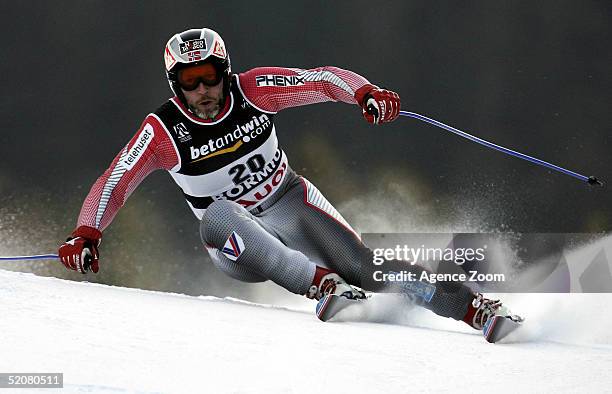 Lasse Kjus of Norway competes during his 11th place finish in the Men's Super G at the FIS Alpine World Ski Championships on January 29, 2005 in...