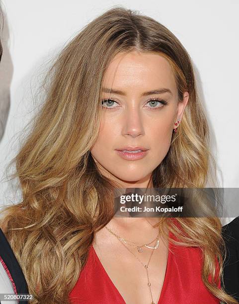 Actress Amber Heard arrives at A24/DIRECTV's "The Adderall Diaires" Premiere at ArcLight Hollywood on April 12, 2016 in Hollywood, California.