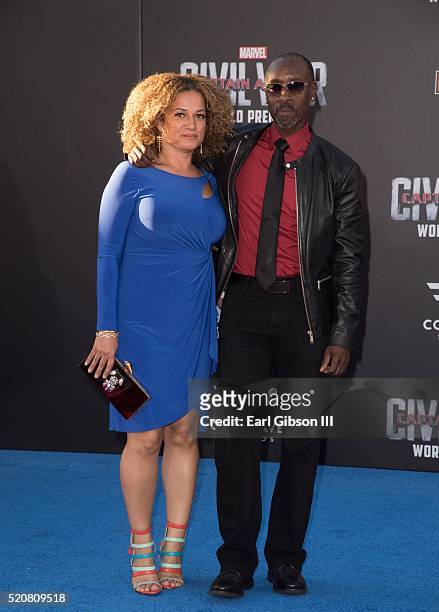 Bridgid Coulter and Actor Don Cheadle attend the Premiere Of Marvel's "Captain America: Civil War" on April 12, 2016 in Hollywood, California.