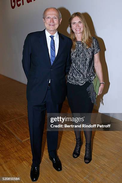 Chairman & Chief Executive Officer of L'Oreal, Chairman of the L'Oreal Foundation Jean-Paul Agon and his companion Sophie Agon attend the Societe des...