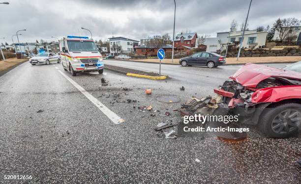 car accident with airbag shown and ambulance - acidente de carro imagens e fotografias de stock