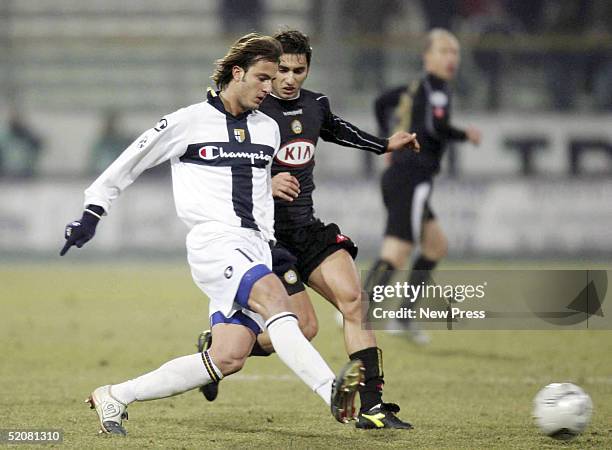 Alberto Gilardino of Parma and Michele Pazienza of Udinese in action during thwe Serie A match between Parma and Udinese at the Stadio Ennio Tardini...