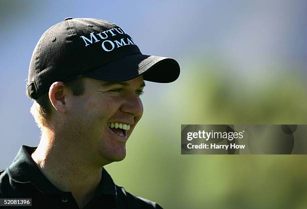 Joe Ogilvie laughs on the 11th hole during the fourth round of the Bob Hope Classic at the La Quinta Country Club on January 29, 2005 in La Quinta,...