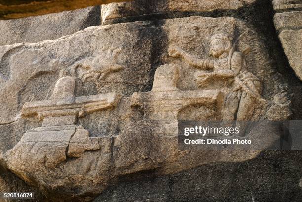 kannappa nayanar one of sixty three nayanmars or holy saivite saints bas relief on rock in veerabhadra temple lepakshi - kannappa stock pictures, royalty-free photos & images