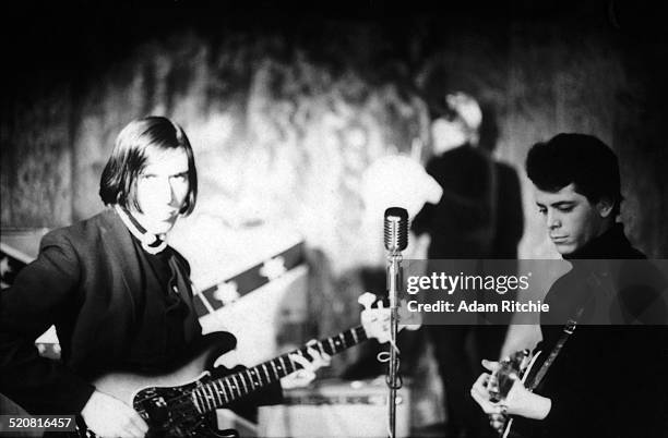 John Cale and Lou Reed of the Velvet Underground performs on stage at the Cafe Bizarre, New York, December 1965.